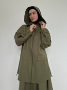 Style élégant et protection contre la pluie Jupe longue imperméable + pull léger avec capuche et fermeture éclair. Parfait pour un look tendance et pratique en toute saison