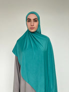 Hijab chic couleur lagon, tissu respirant et extensible.
